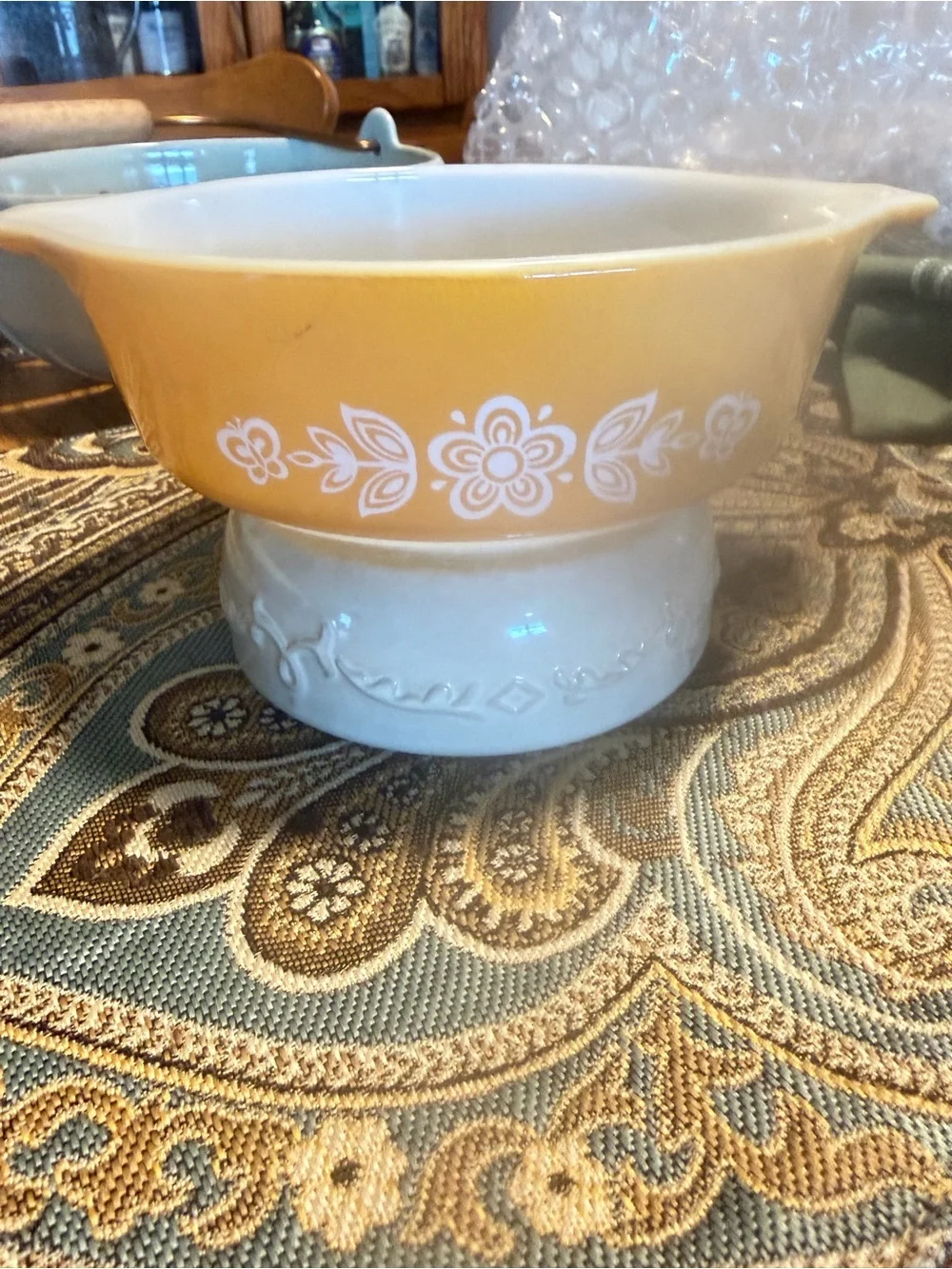 Pyrex Yellow Floral Mixing Bowl with White Interior. Comes with lid.